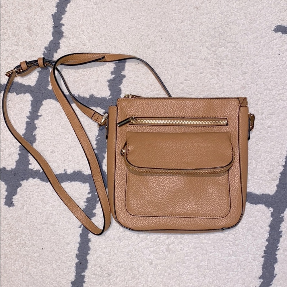 Never used cross body bag/purse light brown color